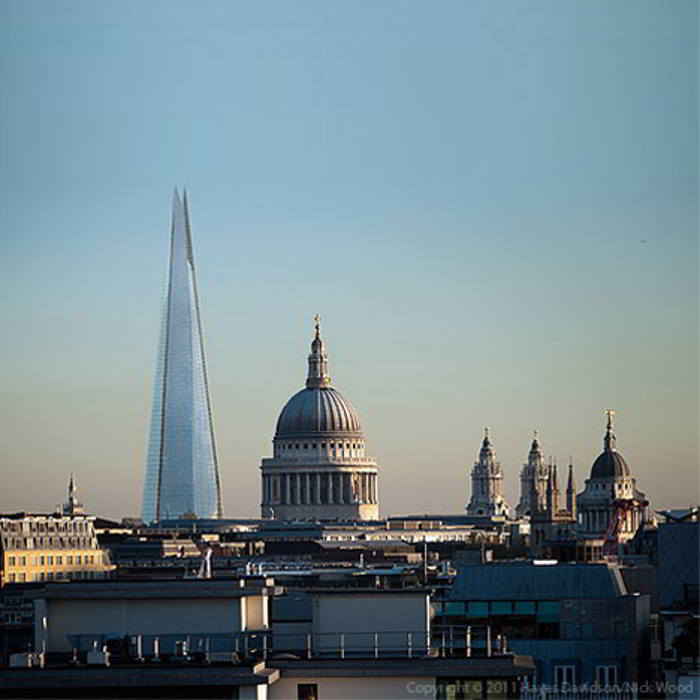 Shard tower, London dwarfing the beautiful St.Pauls Cathedral.