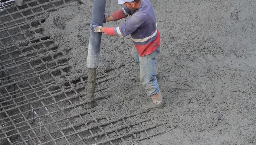 Concrete being poured onto Reinforcing